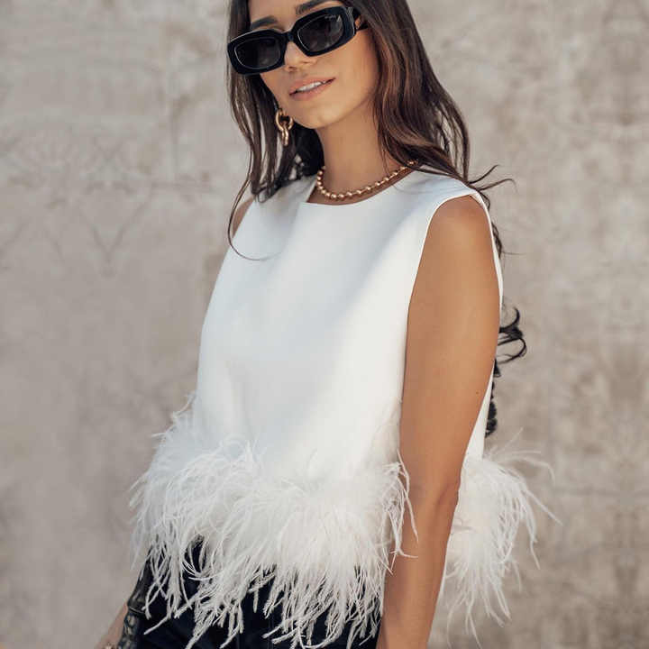 Yesenia® | Elegant sleeveless top with feather accent