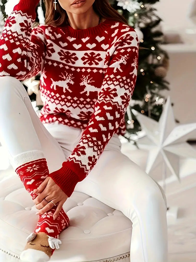 Yara® | Festive sweater with a reindeer and snowflake design.