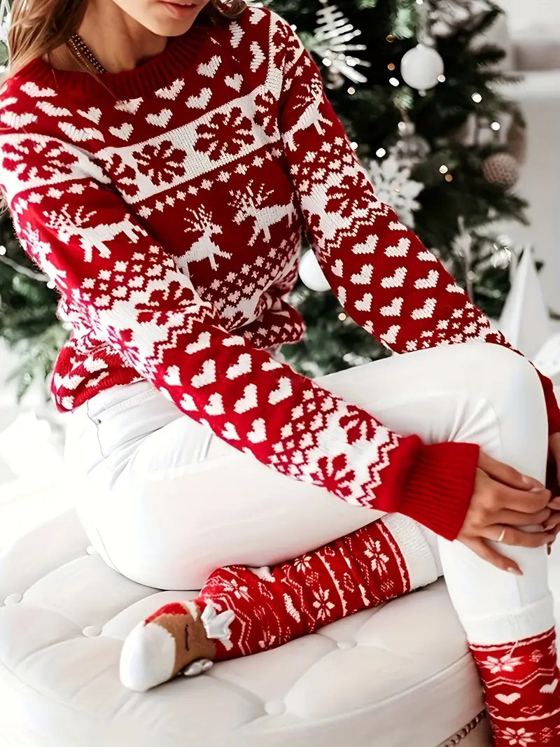 Yara® | Festive sweater with a reindeer and snowflake design.