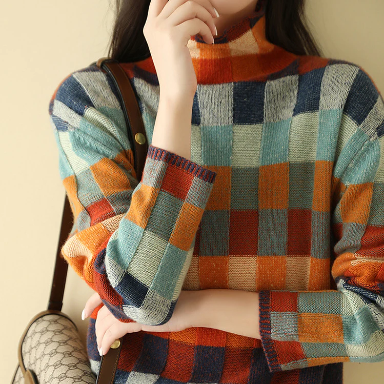 Zelda® | Oversized couture patchwork turtleneck sweater